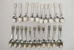 A large quantity of Georgian late Regency and early Victorian solid silver teaspoons by a variety of