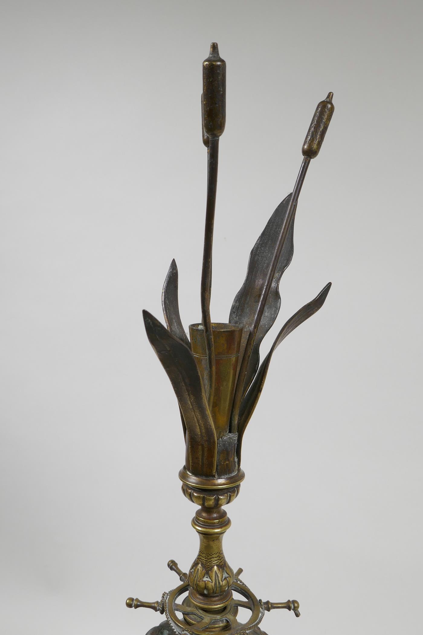 An unusual brass centrepiece on a triform base with nautical decoration, 19½" high, A/F - Image 5 of 5