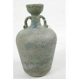 A green studio glass two handled flask/vase with a textured frosted finish, 7½" high