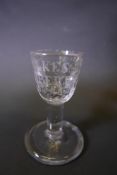 A rare Georgian cordial glass with very heavy foot engraved 'Wilkes Liberty 45' which was a