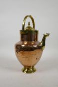 An early copper and brass tea urn, 10" high