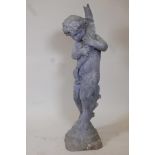 A lead garden fountain in the form of a fisherboy, 40½" high