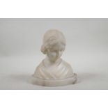 A small marble bust of a young girl, 6½"