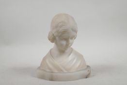 A small marble bust of a young girl, 6½"