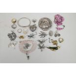 A quantity of silver and other costume jewellery including rings, necklaces, brooches etc