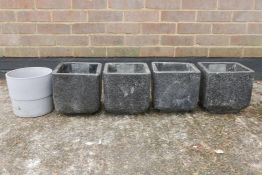 A set of four modern composition terrazzo style pots and another, 8½" x 8½", 8½" high