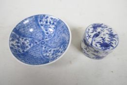 A Chinese, possibly Kangxi blue and white porcelain round box with lid, with flower sprays and a