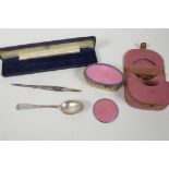 A cased travelling set with hallmarked silver and enamel brush, comb and mirror, hallmarked