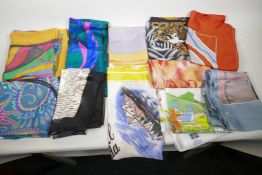 A collection of silk scarves including an Expo 70 site Osaka map, an Expo 67 Montreal, A Codello '