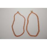 Two coral multi-strand bead necklaces, 21" long