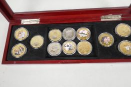 Twelve Queen Elizabeth II commemorative crown coins including enamelled and gold plated (12)