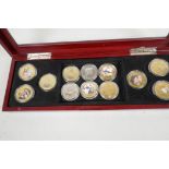 Twelve Queen Elizabeth II commemorative crown coins including enamelled and gold plated (12)