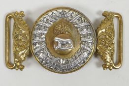 A late C19th Royal Munster Regiment officer's belt buckle cast with the fiery grenade over a tiger