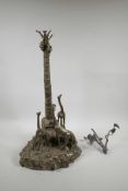 An unusual plated centrepiece in the form of giraffes beneath a date palm, A/F losses, 21½" high
