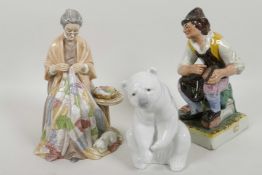 A Lladro porcelain figurine of a polar bear, 5" high, together with a Staffordshire figure of a