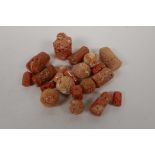 A quantity of loose coral beads of assorted shapes and sizes