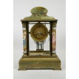 A French onyx and brass cased portico clock with enamelled columns decorated with classical maidens,