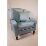 A Wesley Barrell contemporary armchair and matching scatter cushion