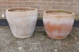 A near pair of terracotta pots, 17" high x 20" diameter