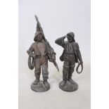 A pair of spelter figures of fishermen, 14½? high