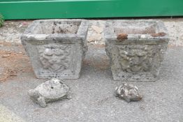 A pair of square form concrete planters, together wth two concrete tortoise garden ornaments, 14½" x