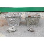 A pair of square form concrete planters, together wth two concrete tortoise garden ornaments, 14½" x