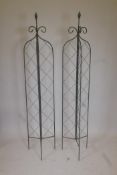 A pair of trifold green painted metal garden sweet pea/bean spires, 72" long