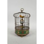 A brass bird cage automaton clock with cloisonne decoration, 8" high