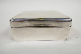 An Edwardian silver cigarette box, A/F, of plain design, lined in balsa wood, by William Comyns