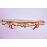 A small Italian painted wall bracket painted with flowers and scrolls, 19" long, 5¼" deep