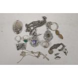A collection of hallmarked silver jewellery including a locket, shield pendant etc, gross 116g