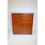 A Victorian mahogany chest of two over three drawers, with original handles inlaid with mother of