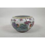 A Chinese famille verte porcelain bowl with a rolled rim, decorated with chrysanthemums, six