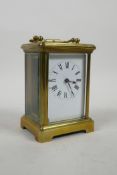 A French brass cased carriage clock, 3" x 2½", 4½" high