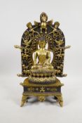 A Sino-Tibetan bronze Buddha and stand, double vajra mark to base, 14½" high