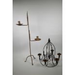 A wrought iron two branch candlestick and a 6 branch wrought iron chandelier, A/F, candlestick 28"