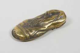 A brass vesta case in the form of an old shoe, 3" long