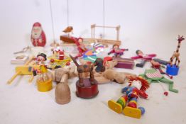 A quantity of children's wood toys, a spinning top, jigsaw and a Triang Wakouwa dog etc
