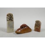 Three Chinese soapstone seals with carved figured and rat decoration to tops, 4" largest