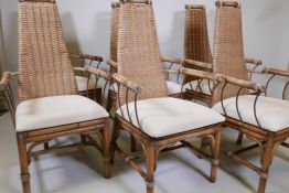 A set of six bamboo and wrought iron conservatory chairs with woven high backs, 42" high