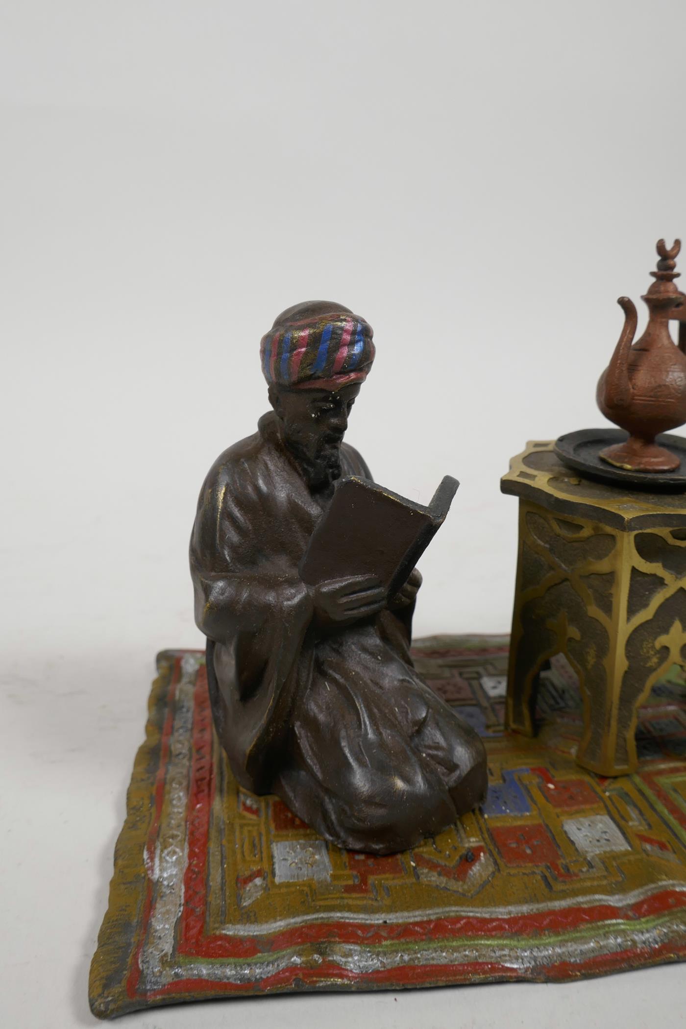 A cold painted bronze figure of a Moor on a carpet, impressed 'B' to base, 6" x 4" - Image 3 of 5