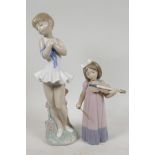A Nao porcelain figure of a young dancer, 12" high, together with another of a young violinist,
