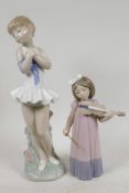 A Nao porcelain figure of a young dancer, 12" high, together with another of a young violinist,