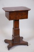 A C19th burr yew wood work box on a graduated column support, 13" x 18", 28" high