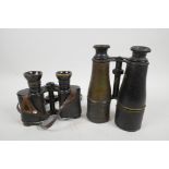 A pair of WWII German binoculars, 6½" long, together with a pair of British military binoculars from