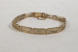 A 9ct gold gate link bracelet, 12.8g, 7" long