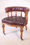 A William IV leather chesterfield desk chair, 30" high