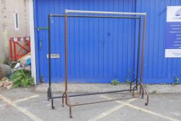A Yugin & Sons shopfitters clothes display rail, circa 1930, and another, largest 66" high x 73"
