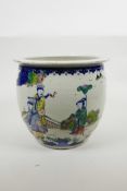 A Chinese famille verte porcelain jardiniere decorated with figures in a landscape, 8½" high x 9½"