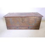 A C19th teak Zanzibar chest with brass stud and banded decoration, 50" x 22" x 21½? high